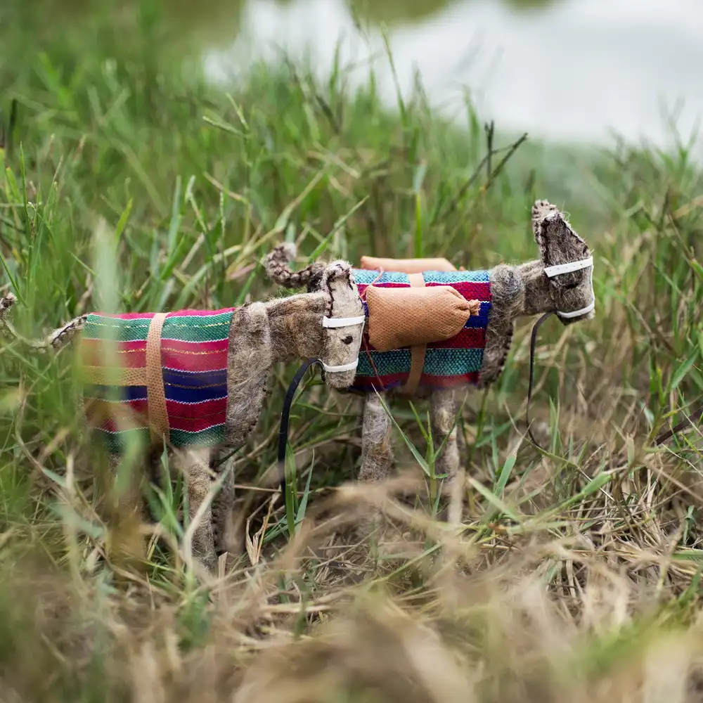 The Cheerful Donkey Doll with Wood Load