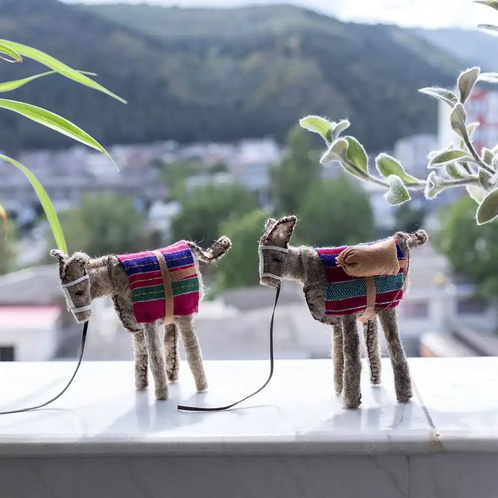 The Cheerful Donkey Doll with Load